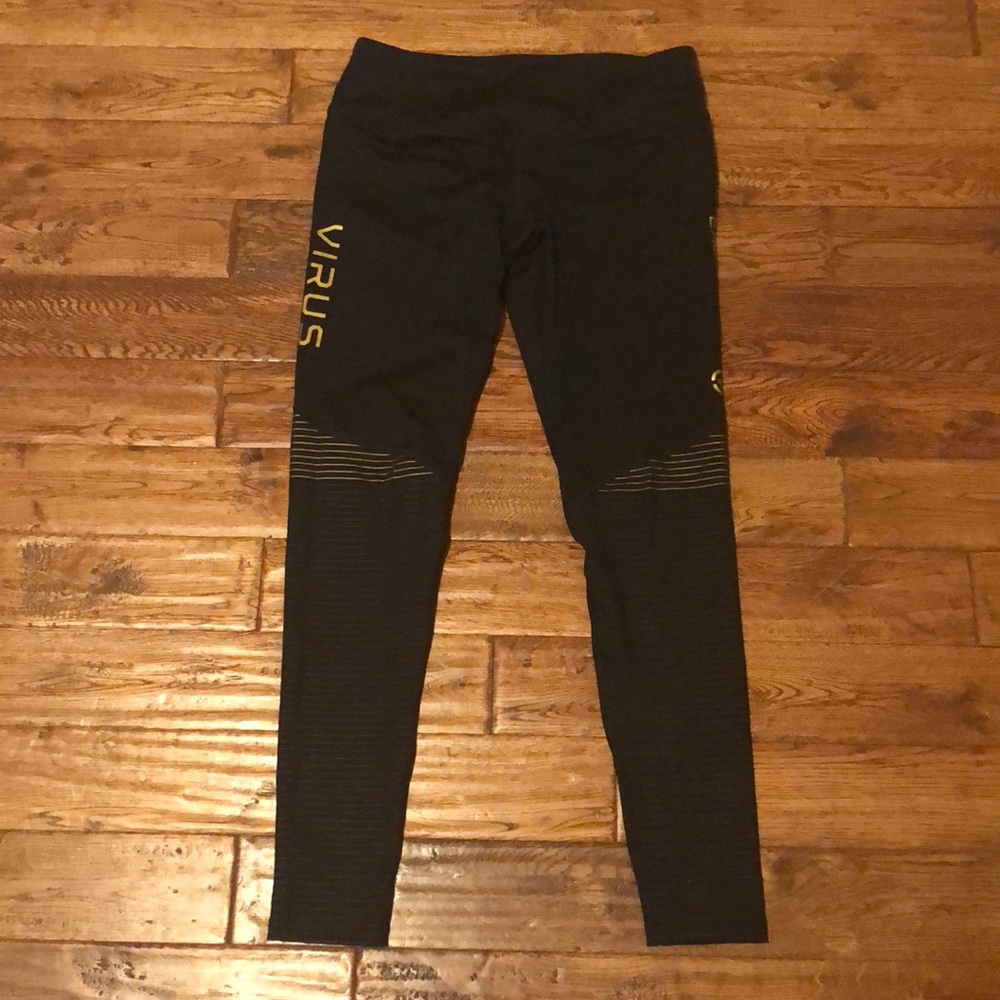 Virus black/gold compression pants.